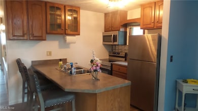 Kitchen features breakfast bar