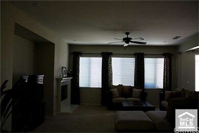 VIEW OF FAMILY ROOM FROM HALLWAY