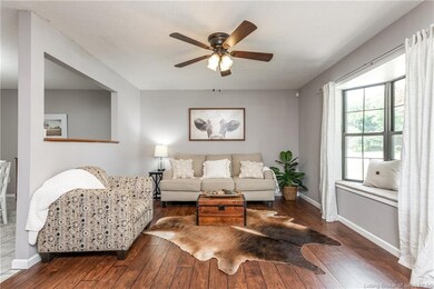 Nice opening between dining area and living room c