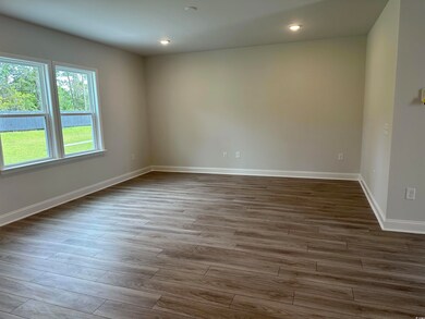 Spare room with hardwood / wood-style floors