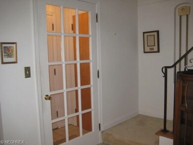 Secondary Glass Paned Door to Ceramic 5x3 Foyer wi