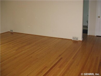 Living Room Freshly painted with refinished hardwo