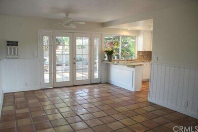 The great room boasts French doors leading to the 