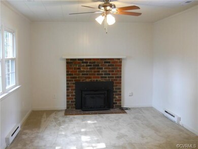 Family Room with Wood Burning Fireplace and Wood S