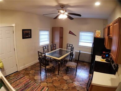 Unit 3's kitchen & dining area.