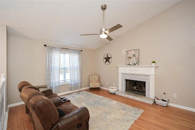 Family Room with Brick Fireplace