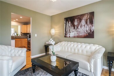 Airy interior with multiple social spaces.