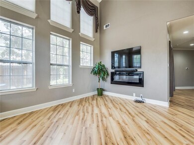 Beautifully light living room has plenty of room f