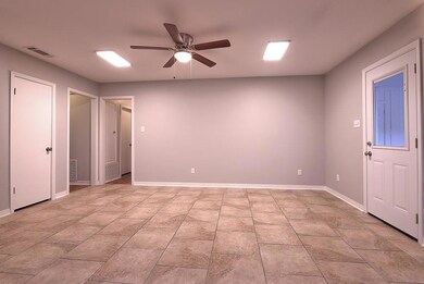 Dining Area.  Door on right leads to outside.
