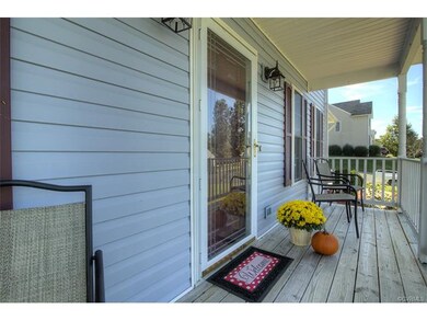 Large, front porch is perfect for relaxing!