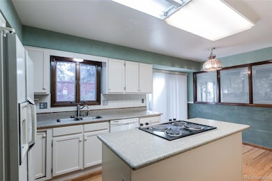 12280 E Vassar Dr, Aurora, CO 80014 - photo 6