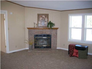 Family room woth the wood burning fireplace.