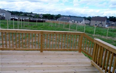 Wood Deck Off of Sliding Doors and Soon to Be Privacy Fenced Yard