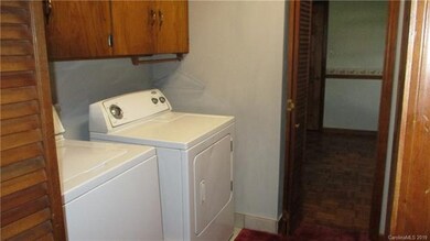 Laundry room with cabinets