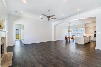 Open floor plan living area with Arch division..