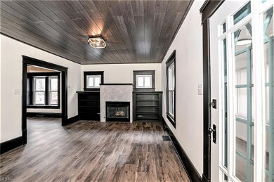 *ENCLOSED FRONT PORCH PRIOR TO THE LIVING RM ENTRA