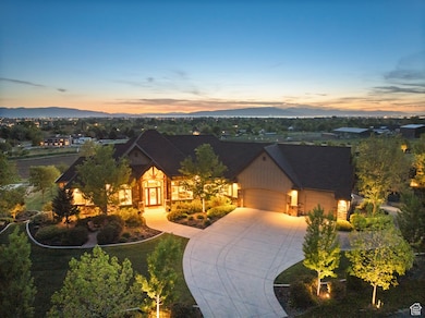 View of front facade with an attached garage and driveway