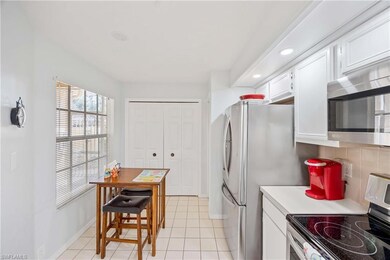 Kitchen with appliances with stainless steel finis