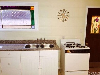Kitchen downstairs.  New granite counter top, stai