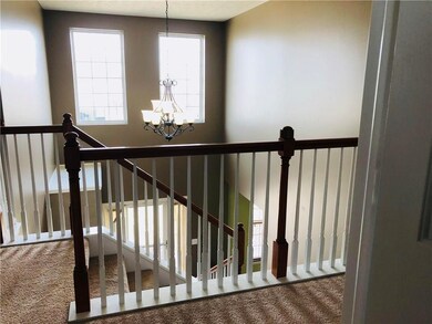 Upstairs hallway looking over the two story entry