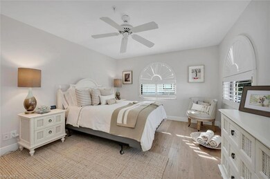 Bedroom featuring ceiling fan and light hardwood / wood-style floors