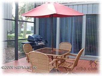 LARGE SCREENED PATIO WITH TILE FLOOR