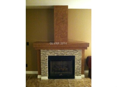 Living Room. Gas fireplace with tile and Venetian