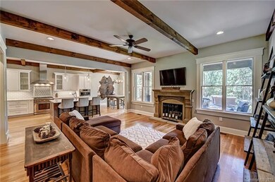 Custom wood beams throughout great room