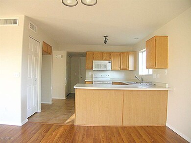 OPEN KITCHEN WITH COUNTER SEATING