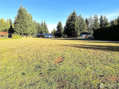 From the back of the property looking at Loomis Trail Rd.