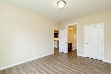 This photo is a representation of a similar home in the neighborhood.  Some features shown may be optional upgrades.  The colors represent those that are in the listed home.