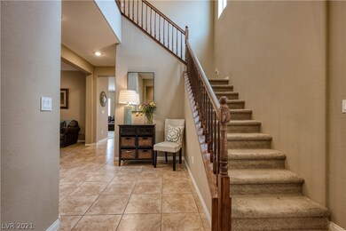 Entry area, with sitting room to the left and stai