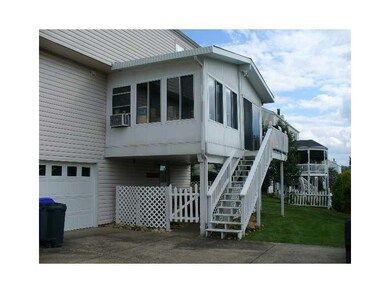 Patio/Deck. Large Florida room with gas grill