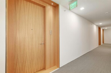 Hallway with carpet flooring and recessed lighting
