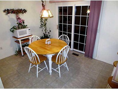 Kitchen. Eat in kitchen area 10 X12 . showing wood