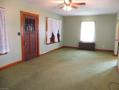 Spacious living room open to the dining room.
