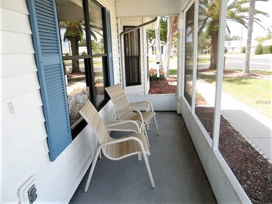 Screened front porch with plenty of shade
