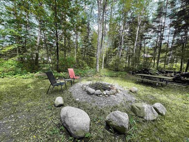 View of yard with a fire pit