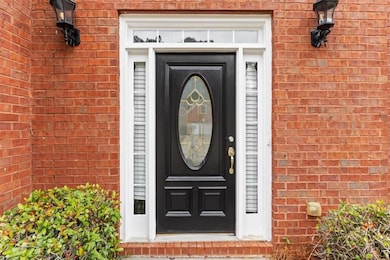 Property entrance with brick siding