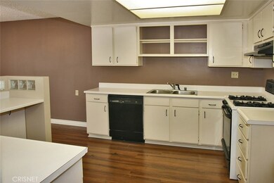 light and bright kitchen with lots of cabinet and counter space.