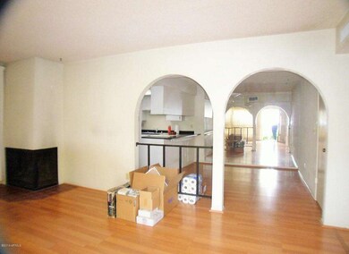 double arches in living room to dining