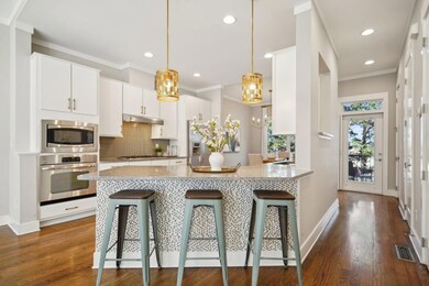 Gourmet kitchen with breakfast bar and walk-in pan