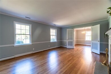 Look at those glorious solid oak hardwood floors in the living room and dining room!