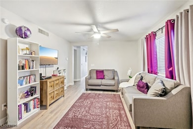 Cozy living room featuring tinted windows FOR A lo