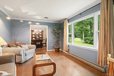 Formal Living Room with hardwood floors and stunni