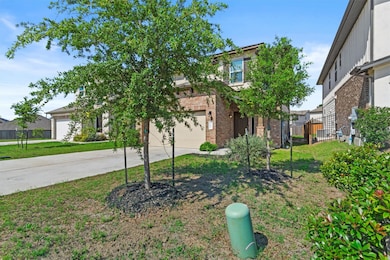 View of property hidden behind natural elements w