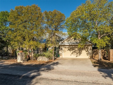 View of property hidden behind natural elements w