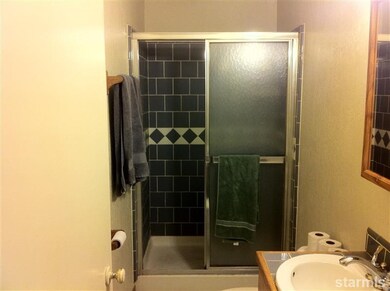 Remodeled shower in hallway