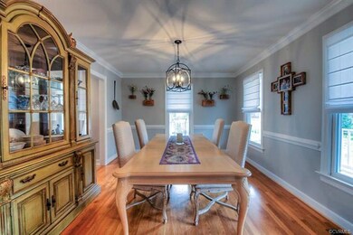 The owners have added fresh paint and modern light fixtures throughout the house.