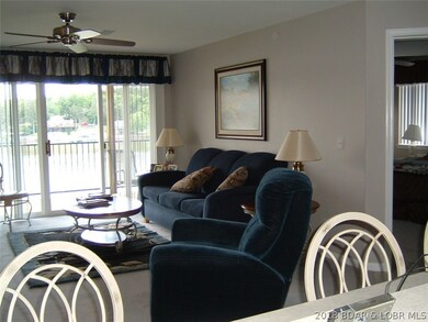 Comfortable furniture and glass slider going to th